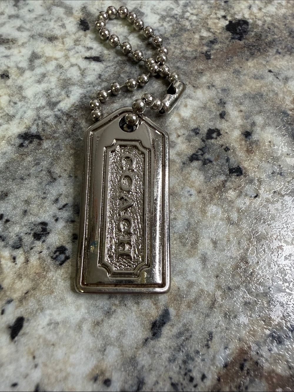 Coach Silver Tone Embossed Tag Keychain - Picture 4 of 4